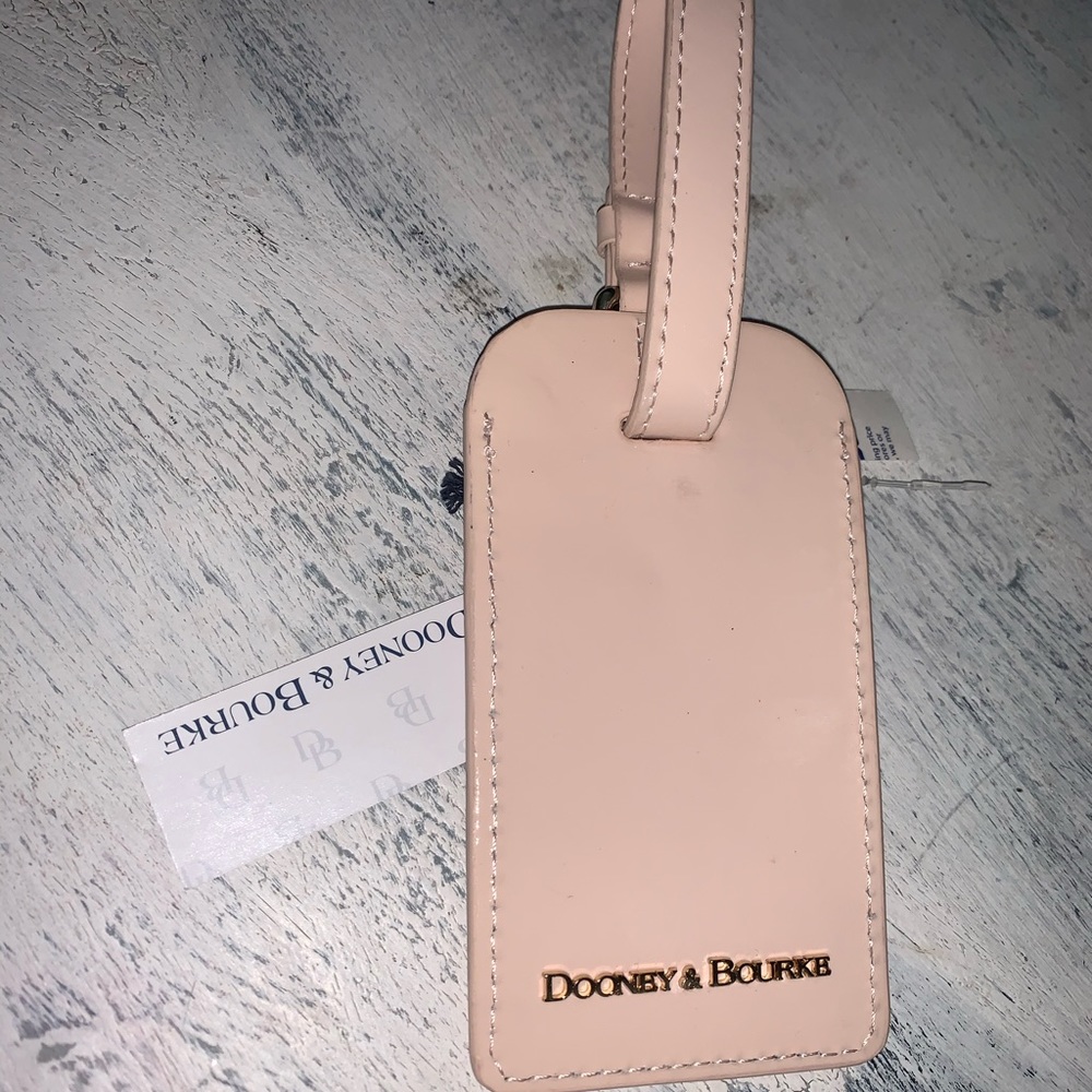Dooney & Bourke pink patent leather tag